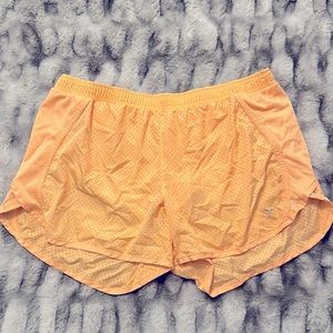 Orange/ peach Old Navy athletic/running shorts, size Large.